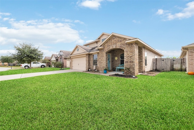 view of front of house with a garage and a front yard