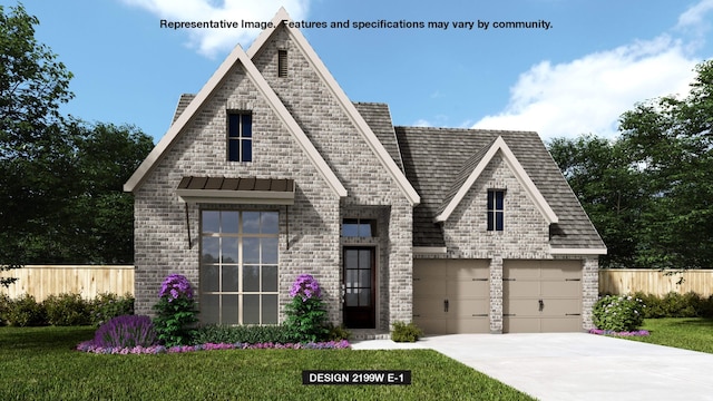 view of front of house with a garage and a front yard