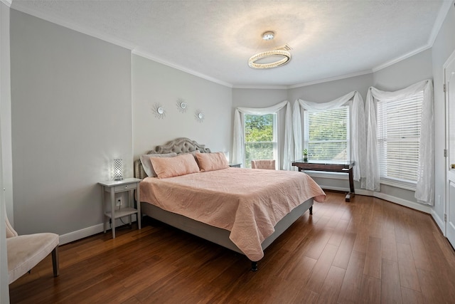 bedroom with a textured ceiling, crown molding, and dark wood-type flooring