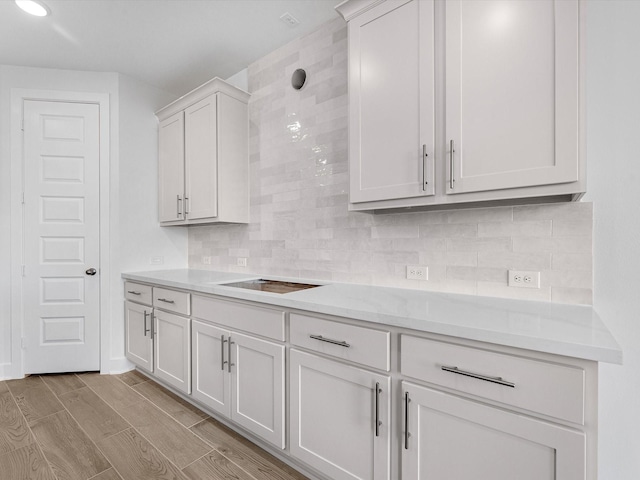 kitchen featuring white cabinetry