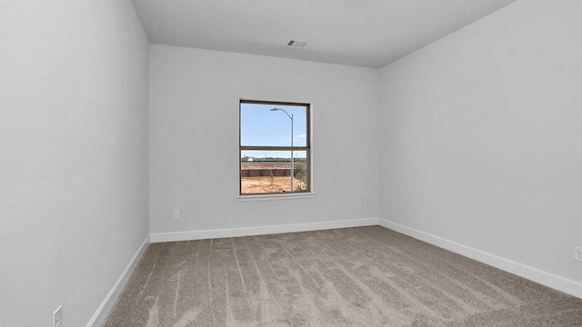 empty room featuring carpet