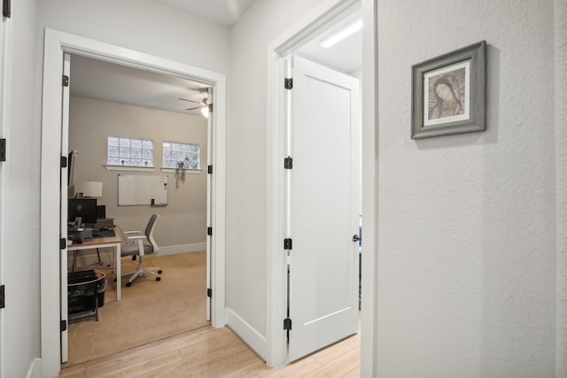 hall featuring light wood-type flooring