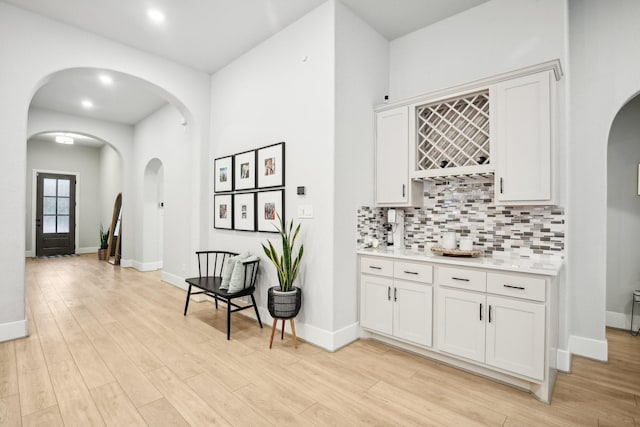 hallway with light wood-type flooring