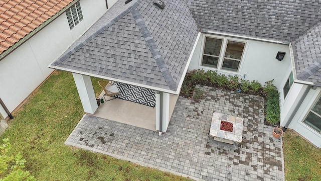 exterior space featuring a fire pit