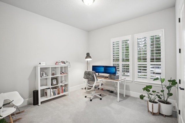 view of carpeted office space