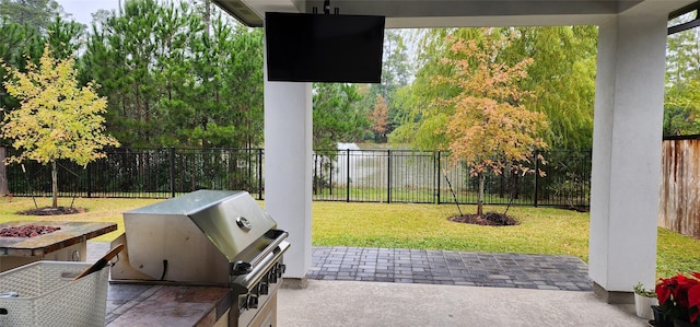 view of patio with a grill and exterior kitchen