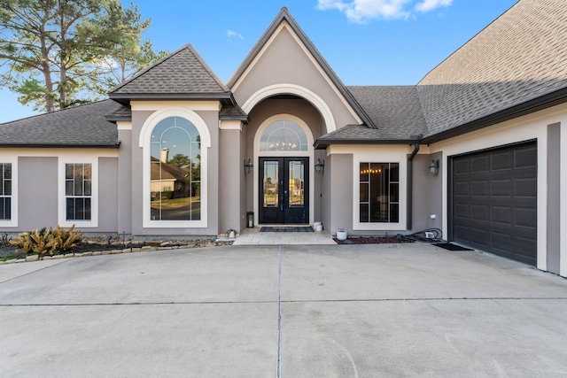 view of front of home with a garage