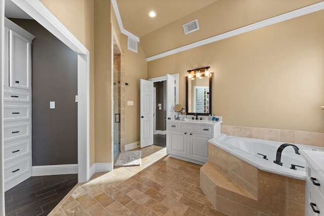 bathroom with shower with separate bathtub, vanity, a towering ceiling, and crown molding