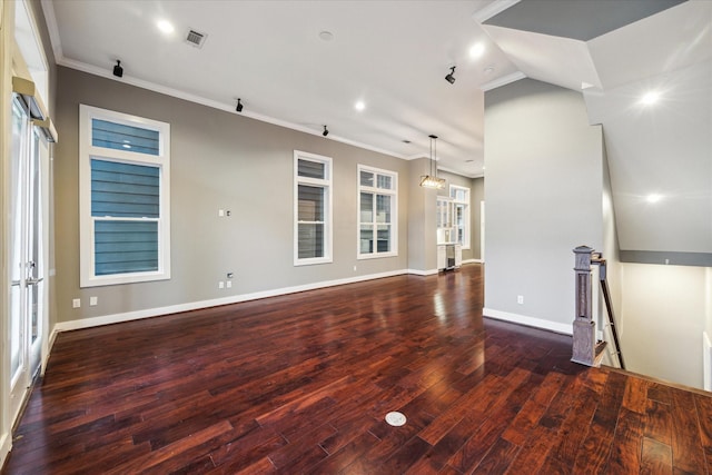 unfurnished room featuring dark hardwood / wood-style flooring and crown molding