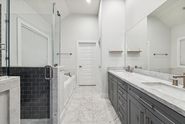 bathroom featuring vanity, lofted ceiling, and plus walk in shower