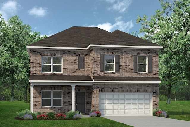 view of front of property featuring a garage and a front yard