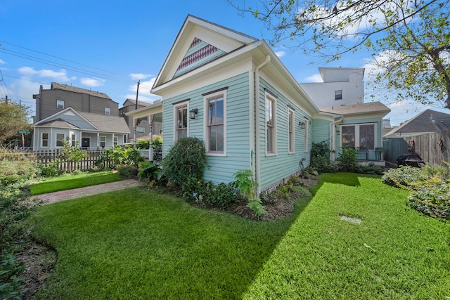 view of home's exterior featuring a yard