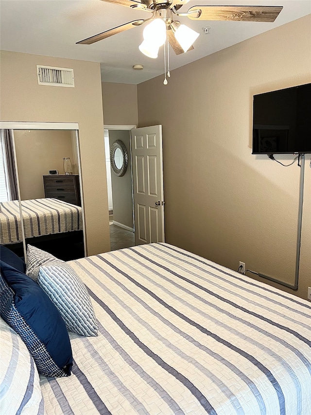 bedroom featuring ceiling fan