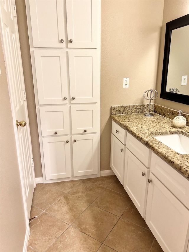 bathroom featuring vanity and tile patterned floors