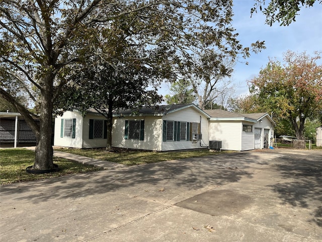 view of front of property with cooling unit