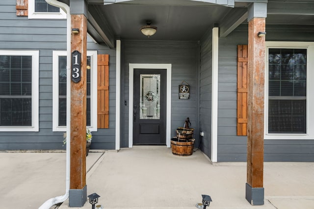 property entrance with a porch