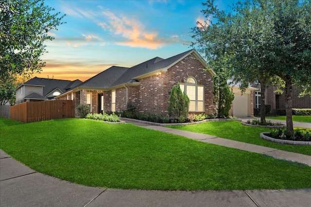 view of front of house featuring a lawn