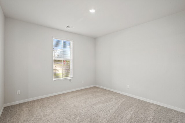 view of carpeted spare room