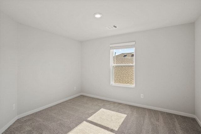 unfurnished room with carpet