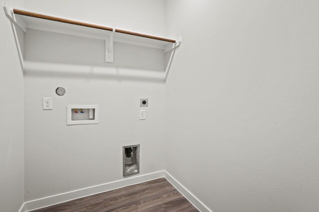 laundry room featuring washer hookup, hookup for a gas dryer, hookup for an electric dryer, and dark wood-type flooring