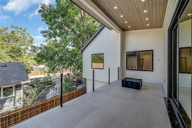 view of patio / terrace with a balcony