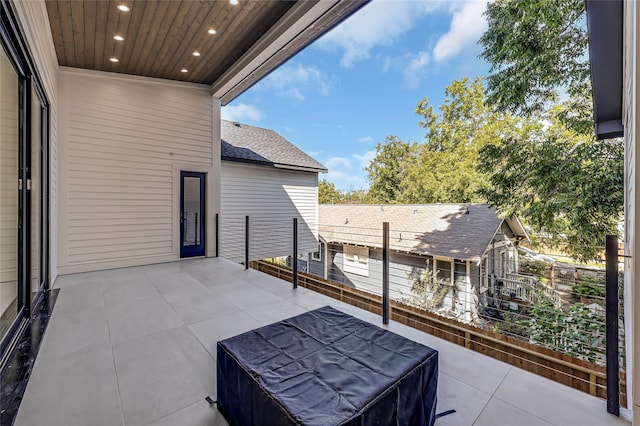 view of patio with a balcony