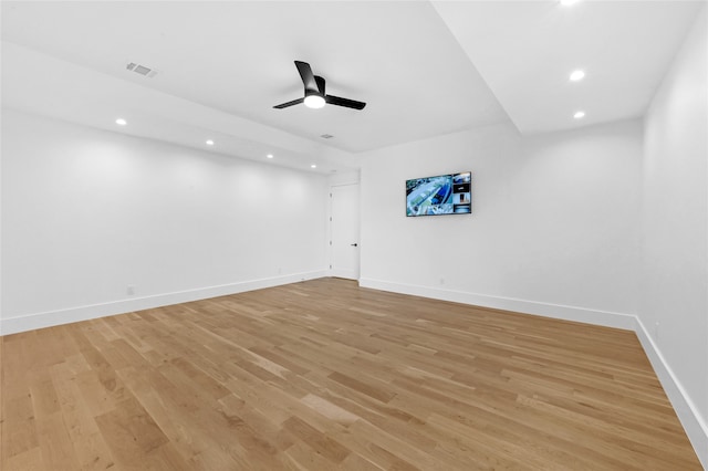 unfurnished room featuring light wood-type flooring and ceiling fan