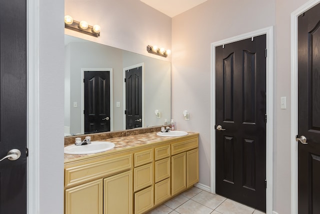 bathroom with vanity and tile patterned floors