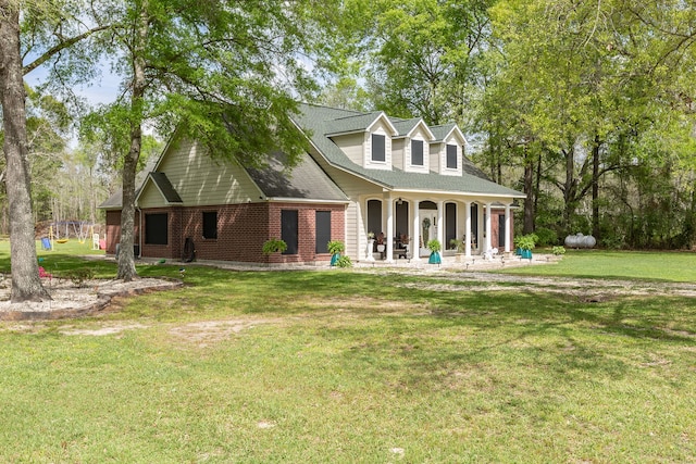 back of house featuring a porch and a yard