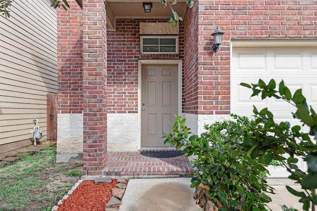 property entrance featuring a garage