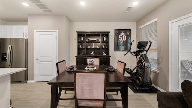 dining room featuring light hardwood / wood-style flooring