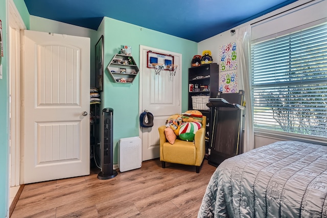 bedroom featuring light hardwood / wood-style floors