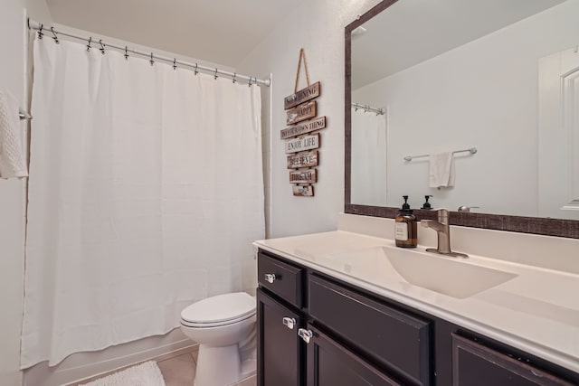 full bathroom featuring vanity, tile patterned flooring, toilet, and shower / tub combo