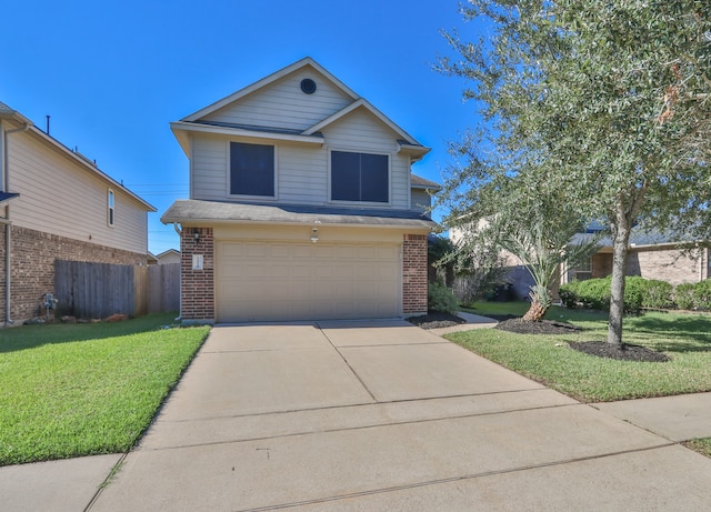 front facade featuring a garage and a front yard