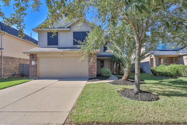 view of front facade featuring a garage and a front yard