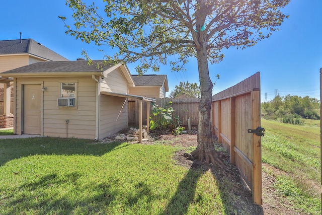 view of property exterior featuring a yard and cooling unit