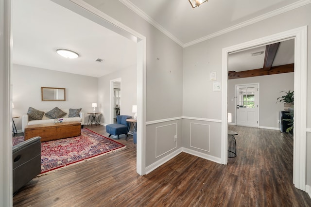 corridor with beam ceiling, dark hardwood / wood-style flooring, and crown molding