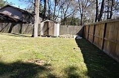 view of yard featuring a storage unit