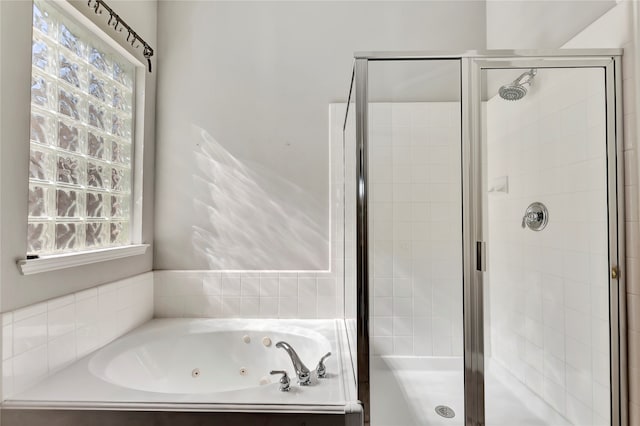 bathroom with separate shower and tub