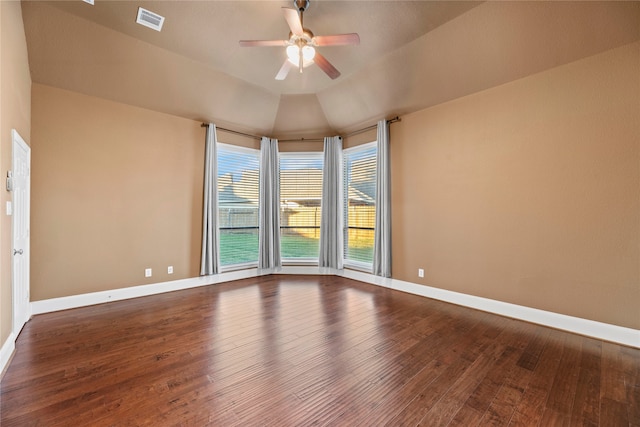 unfurnished room with ceiling fan, wood-type flooring, and lofted ceiling