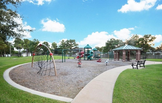 view of play area featuring a gazebo and a lawn