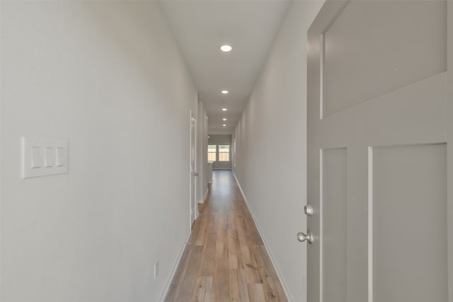 corridor featuring light wood-type flooring