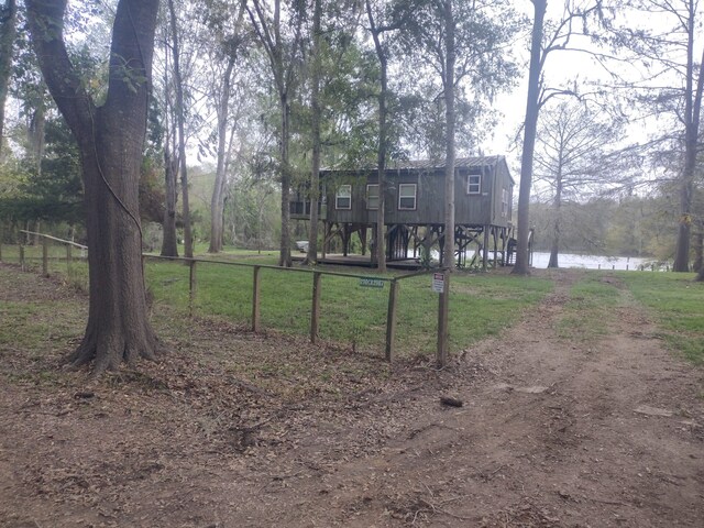 view of yard with a water view