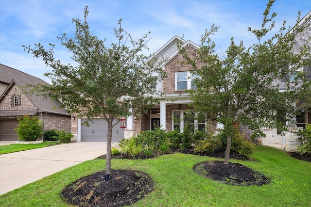 view of front facade featuring a garage and a front lawn