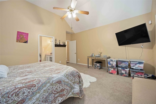 carpeted bedroom featuring high vaulted ceiling, ensuite bath, and ceiling fan