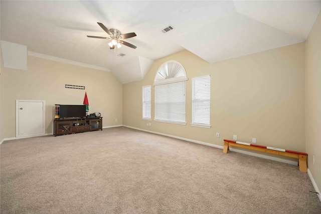 carpeted living room with vaulted ceiling and ceiling fan