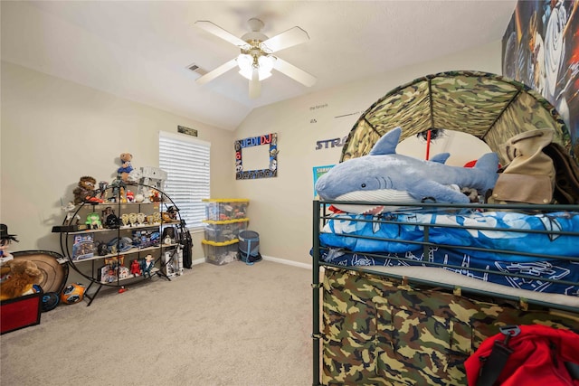 bedroom featuring carpet, ceiling fan, and vaulted ceiling