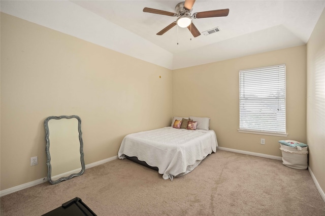 carpeted bedroom featuring ceiling fan and lofted ceiling