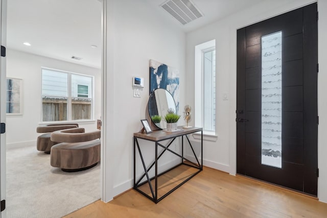 foyer entrance featuring light hardwood / wood-style flooring