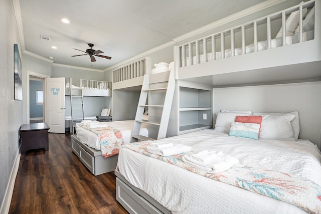 bedroom with dark hardwood / wood-style floors, ceiling fan, and crown molding